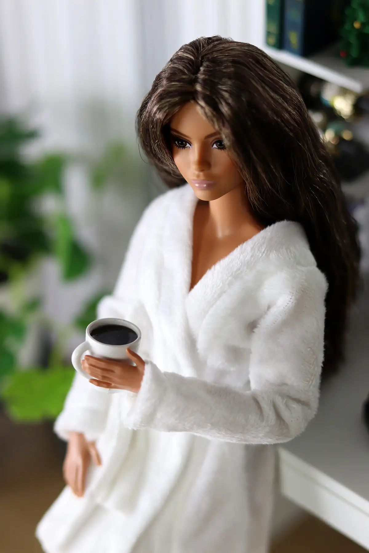 Barbie Looks Lina doll relaxing with a cup of coffee