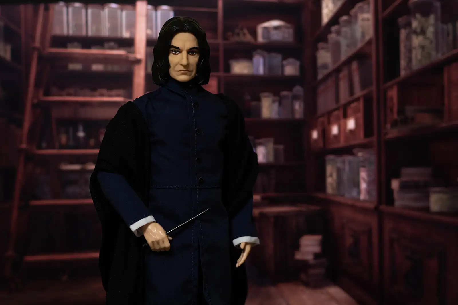 Mattel Severus Snape doll in the Potions storeroom with ingredient shelves