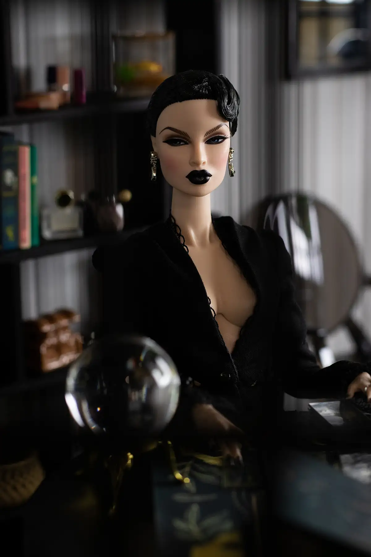 Witch Obsidian seen behind a crystal ball