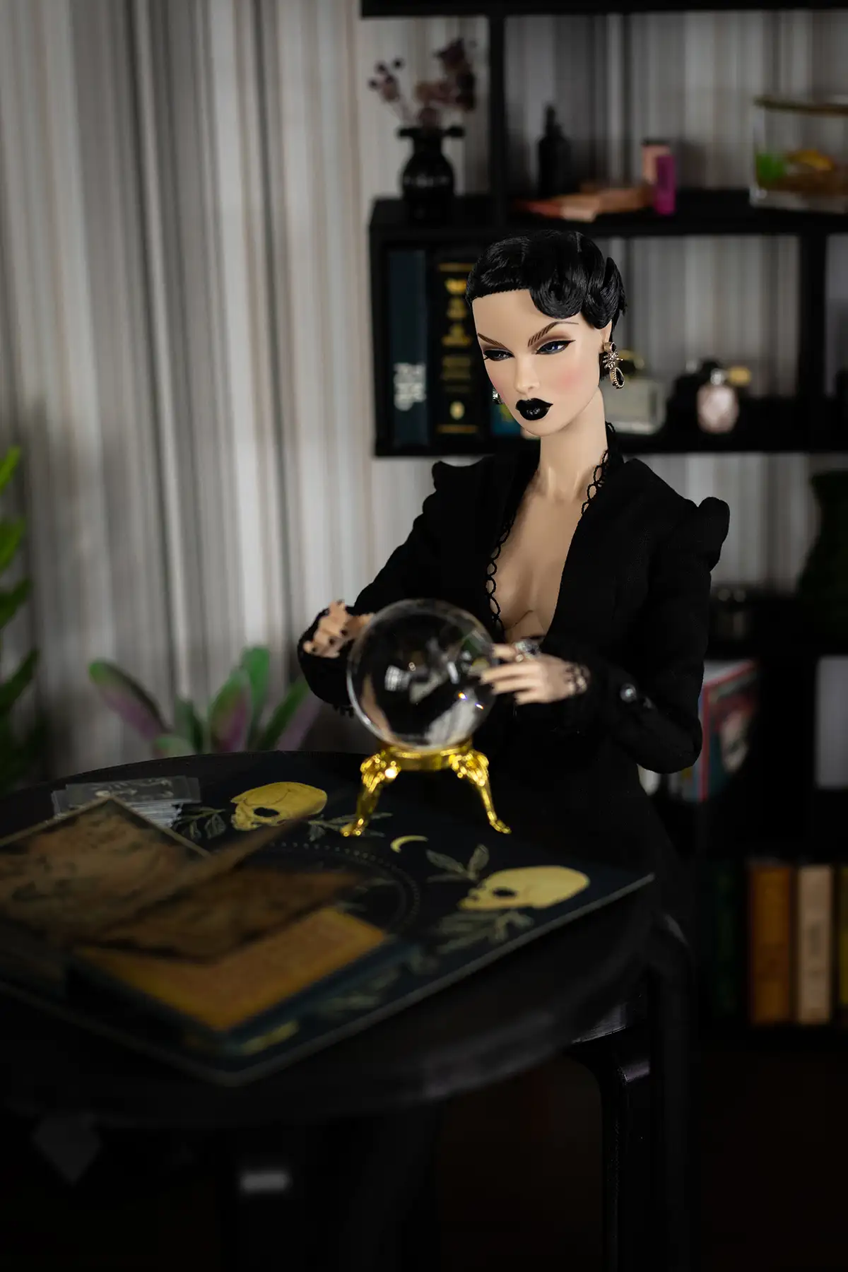 Witch Obsidian seated at a table with a crystal ball
